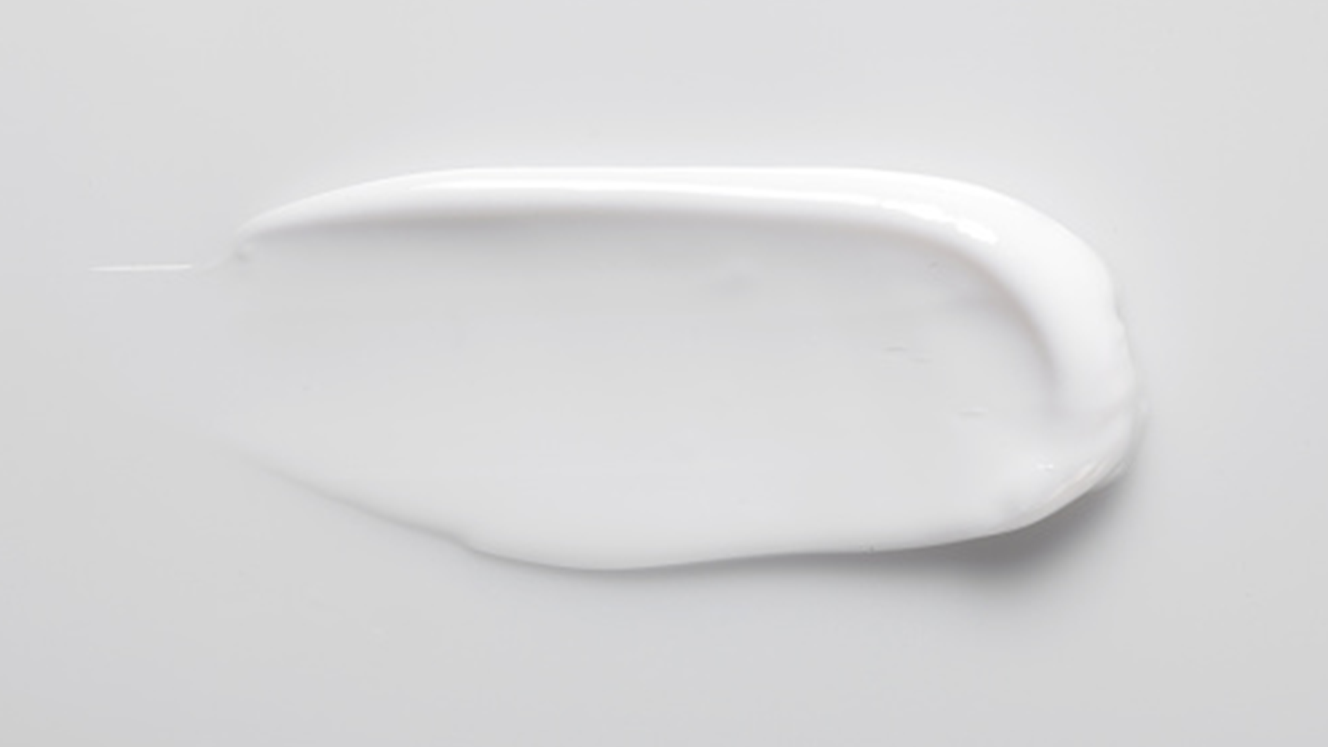 Trace de peinture blanche texturée.